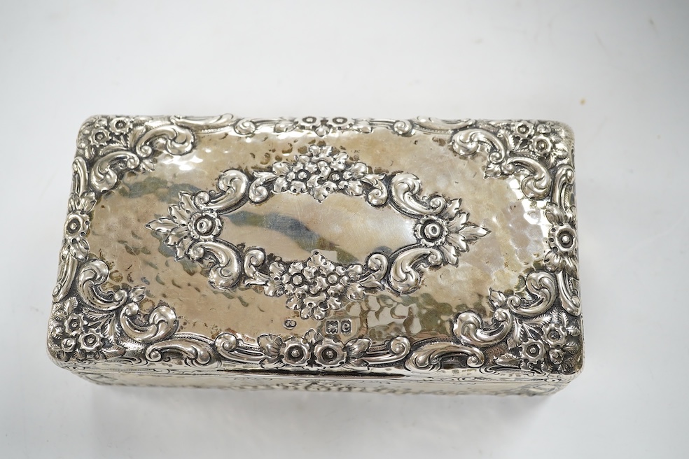 A late Victorian embossed silver rectangular trinket box (converted from a cigarette box), Joseph Braham, London, 1900, 17.5cm. Condition - fair to good